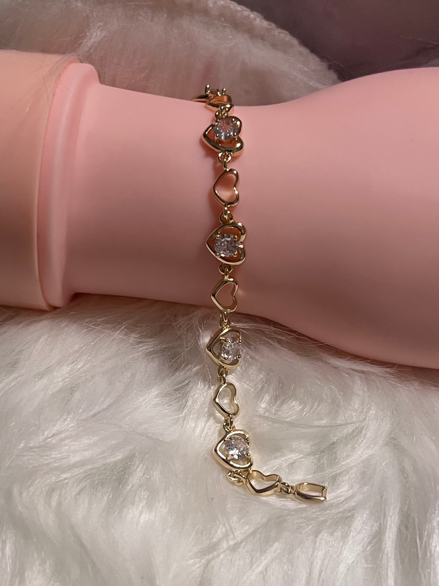 Pulsera de tenis con corazón de oro