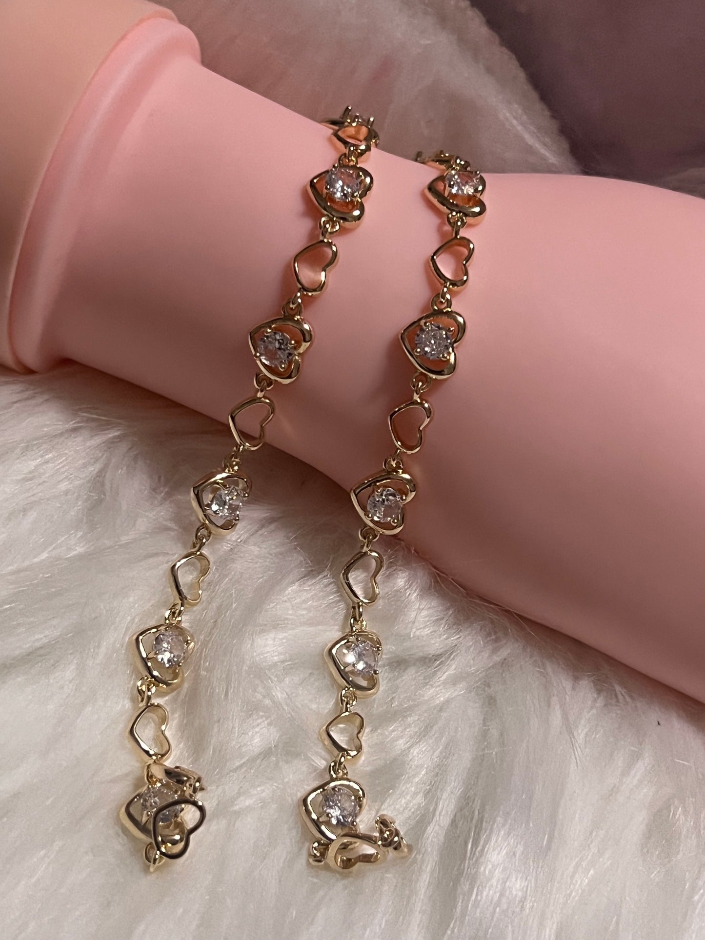 Pulsera de tenis con corazón de oro