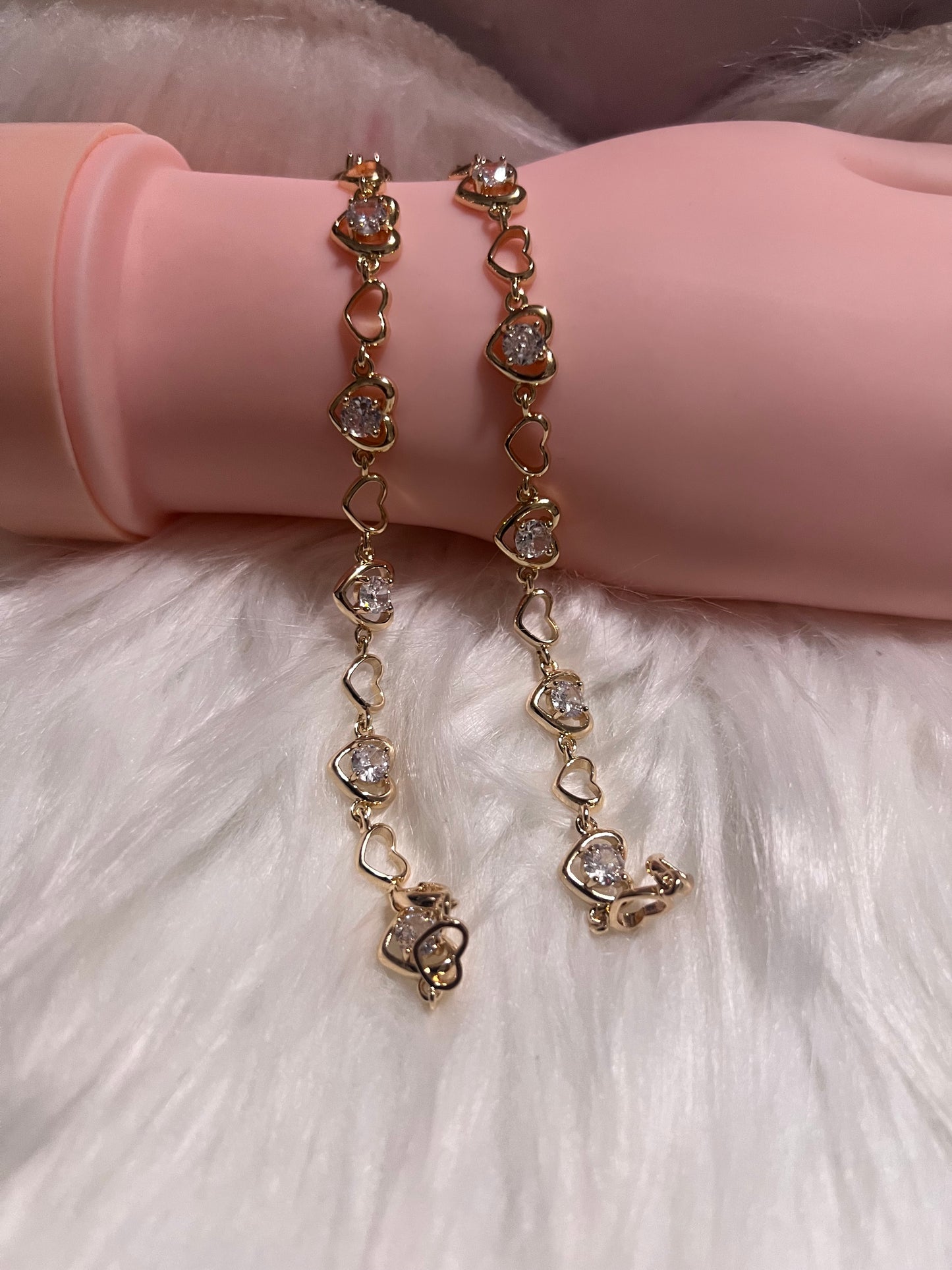 Pulsera de tenis con corazón de oro
