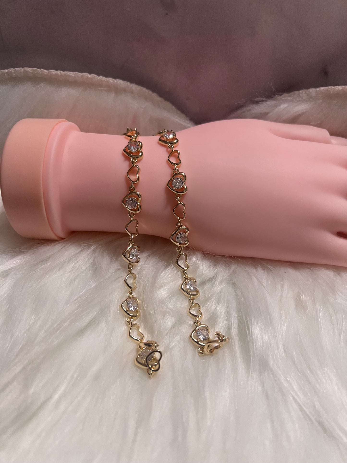 Pulsera de tenis con corazón de oro