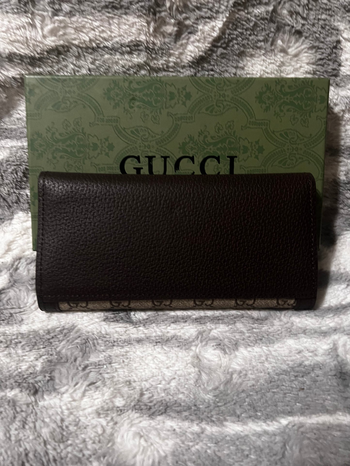 La billetera G de Gloria