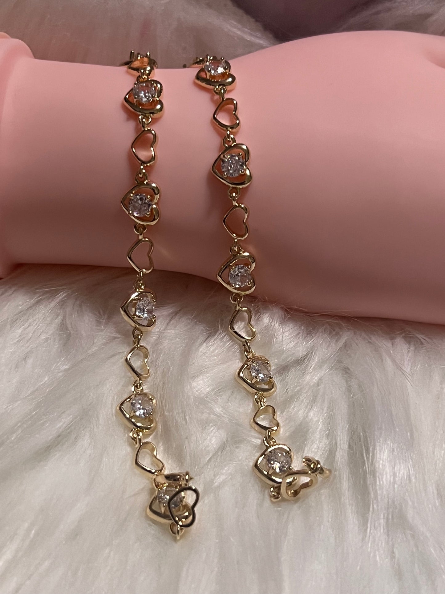 Pulsera de tenis con corazón de oro