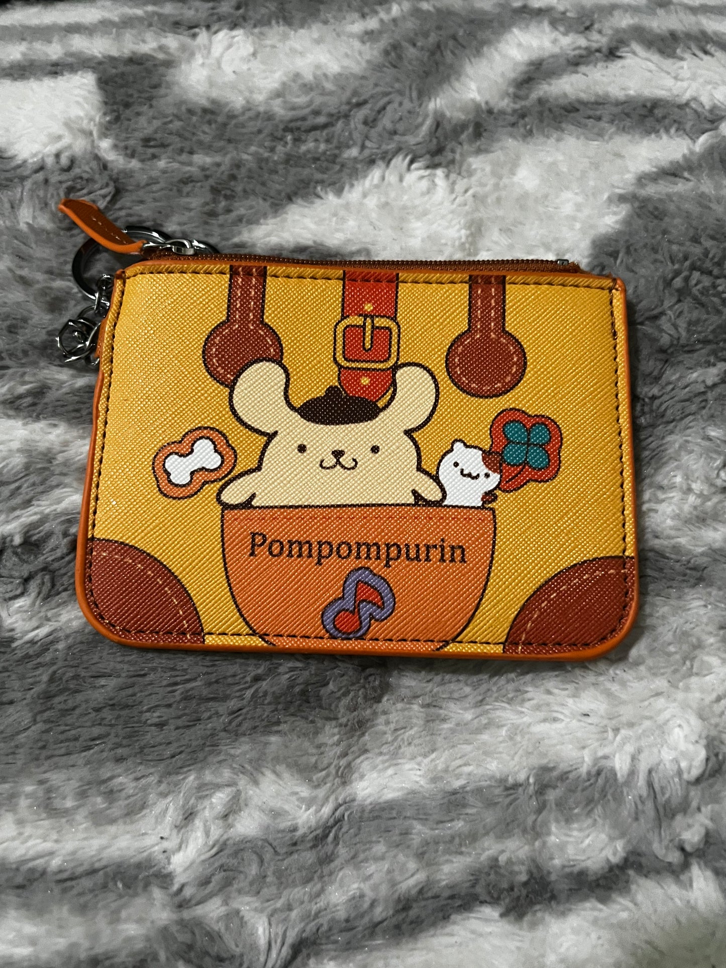 Monederos con llavero de la familia Sanrio
